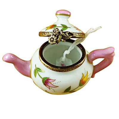 Beautiful ceramic teapot with intricate tulip designs and gold accents