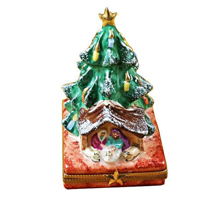 Tree with Manger figurine depicts the nativity scene with intricate details