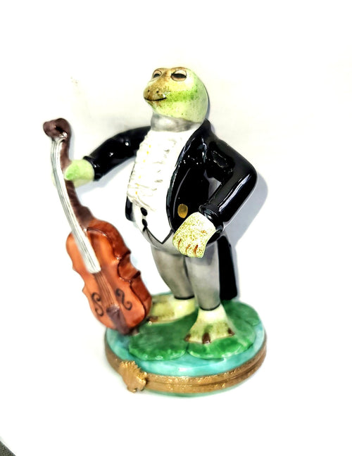 An adorable plush frog in a dapper tuxedo, playing a miniature cello