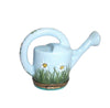 Beautifully designed watering can with daisies adorning the handle