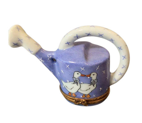 Colorful watering can with adorable duck designs, perfect for gardening and watering plants in the garden or greenhouse