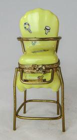 Yellow baby high chair with adjustable straps and removable tray 