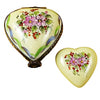 Yellow and green heart-shaped ceramic dish with a removable heart inside