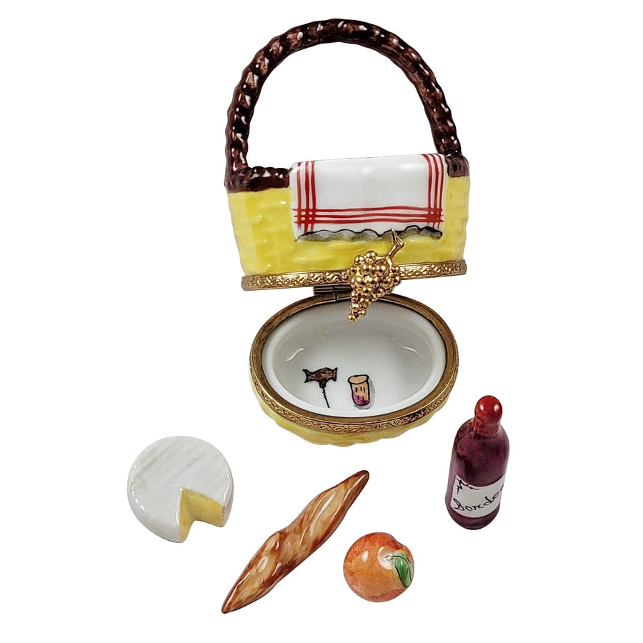 Yellow Picnic Basket with Bread, Wine, Cheese And Fruit
