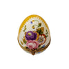Gorgeous Easter egg in yellow, adorned with intricate rose and flower patterns
