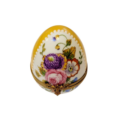 Gorgeous Easter egg in yellow, adorned with intricate rose and flower patterns